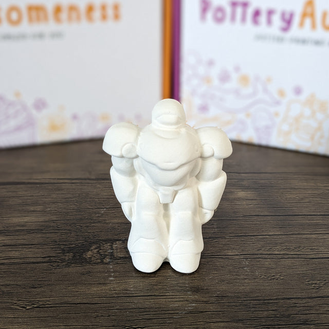 Small unpainted pottery bisque robot, front view